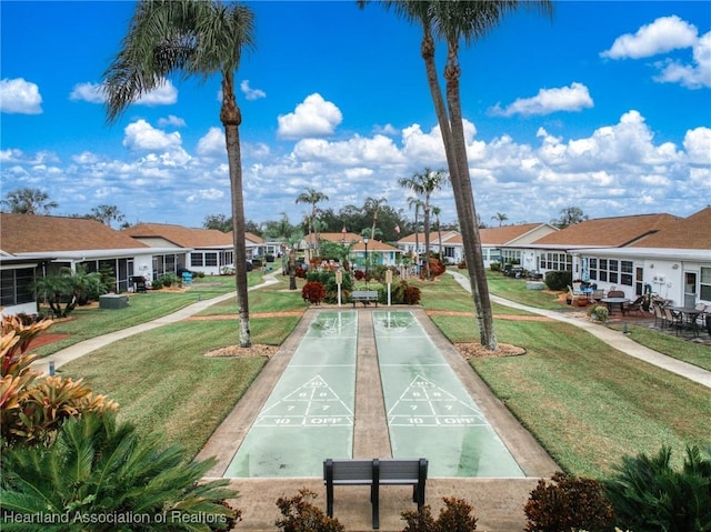 view of community with a yard