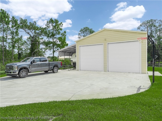 garage featuring a carport