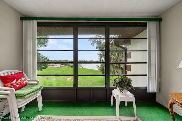 19 A Miracle Ave, Avon Park, FL 33825 - sunroom featuring a water view