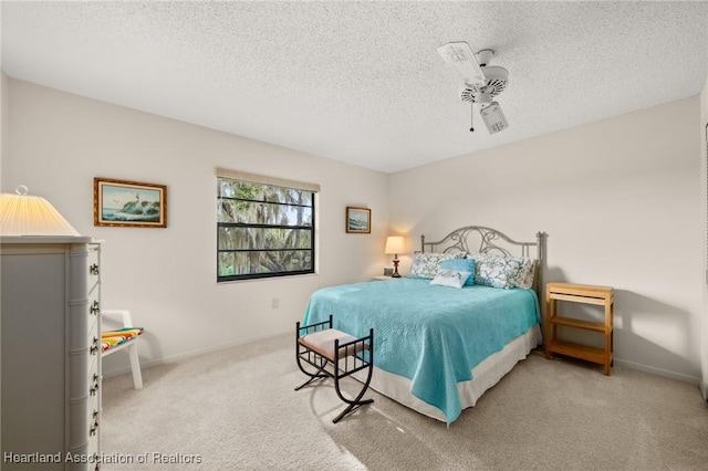 19 A Miracle Ave, Avon Park, FL 33825 - carpeted bedroom with a textured ceiling and baseboards