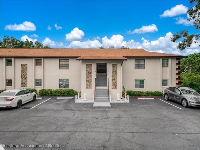 19 A Miracle Ave, Avon Park, FL 33825 - view of property featuring uncovered parking