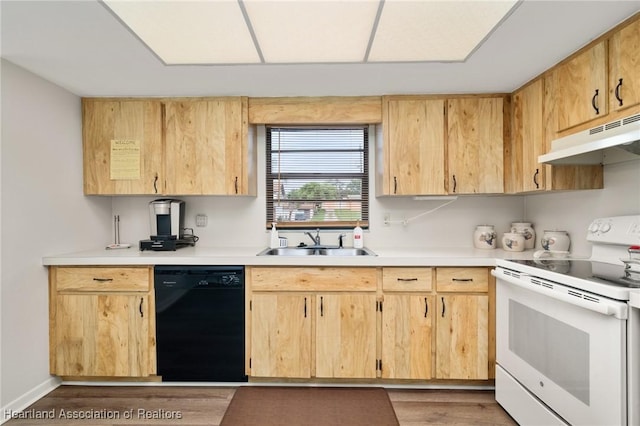 19 A Miracle Ave, Avon Park, FL 33825 - kitchen featuring black dishwasher, white electric range oven, under cabinet range hood, light brown cabinetry, and light wood-type flooring