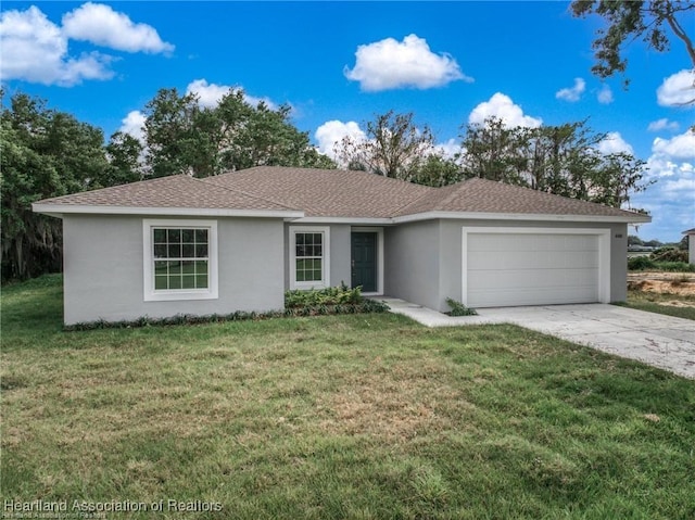 single story home with a garage and a front yard