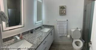 3709 Almeria Ave, Sebring, FL 33875 - bathroom with toilet and double vanity