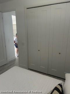 unfurnished bedroom with a closet