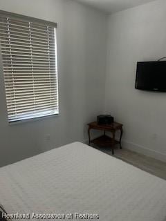 bedroom with baseboards