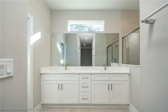 bathroom featuring vanity and walk in shower