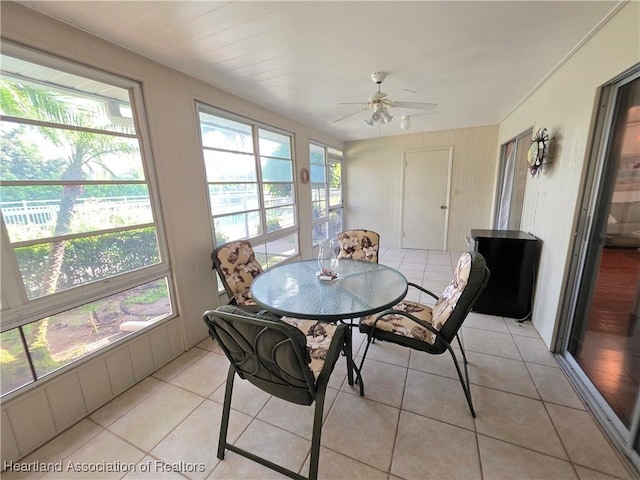 4730 Granada Blvd, Sebring, FL 33872 - sunroom / solarium featuring tile patterned flooring, ceiling fan, and outdoor dining area