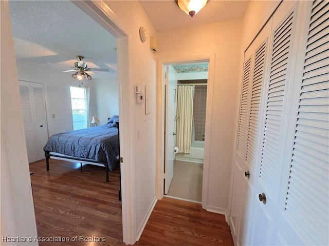 4730 Granada Blvd, Sebring, FL 33872 - bedroom featuring wood finished floors, a textured ceiling, and a closet