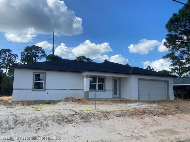 view of front of home with a garage