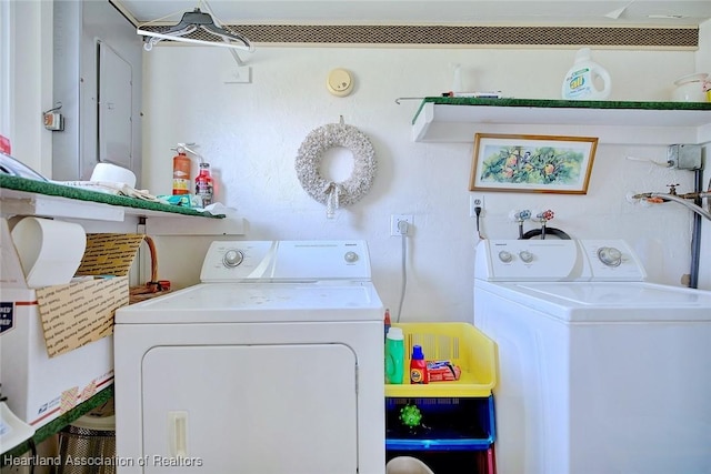 laundry area featuring washer and clothes dryer