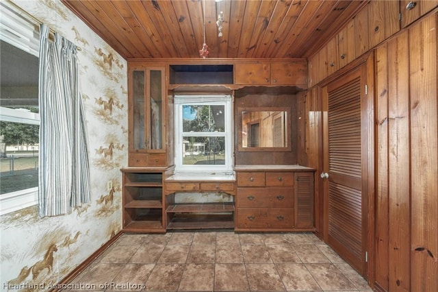 interior space featuring wood ceiling