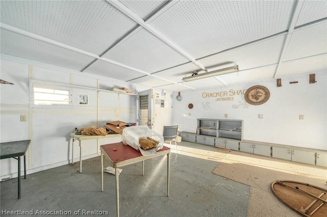 interior space featuring concrete flooring