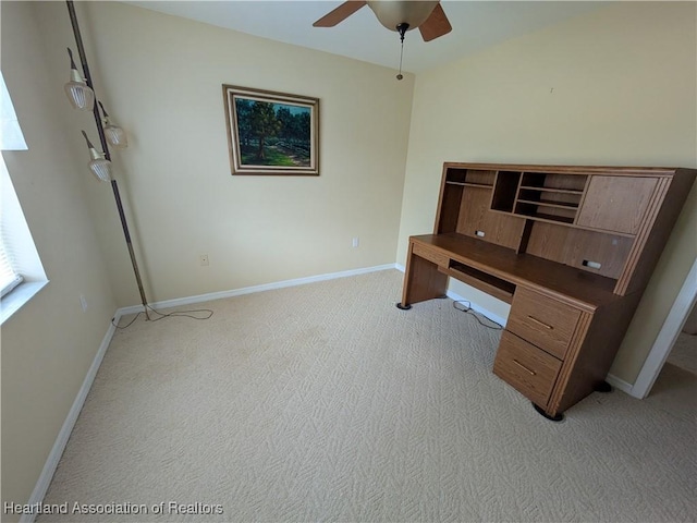 office area featuring light colored carpet and ceiling fan