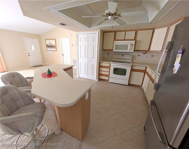 kitchen with white appliances, light tile patterned floors, a ceiling fan, visible vents, and light countertops