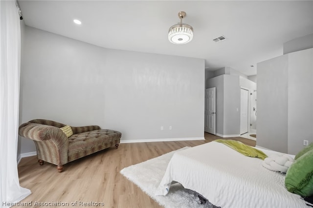 bedroom featuring light hardwood / wood-style flooring