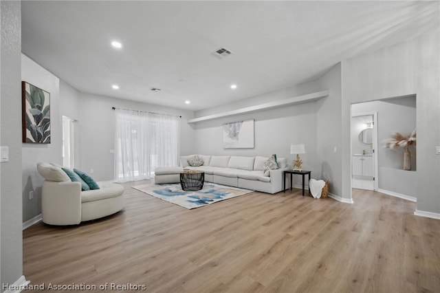 living room featuring light hardwood / wood-style floors