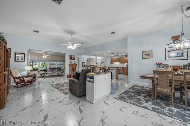 living room featuring marble finish floor, visible vents, and baseboards