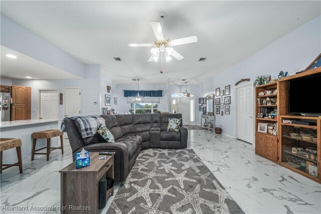 living room featuring ceiling fan, recessed lighting, visible vents, baseboards, and marble finish floor