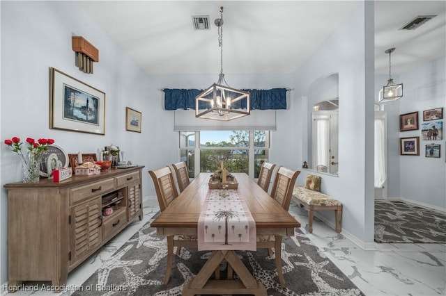 dining room featuring marble finish floor, visible vents, a notable chandelier, and baseboards