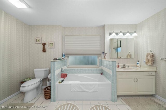 bathroom with a bath, tile patterned flooring, toilet, and wallpapered walls