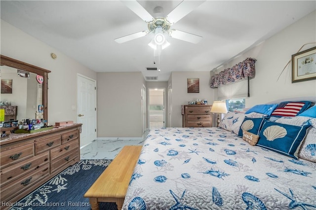 bedroom with marble finish floor, visible vents, and ceiling fan