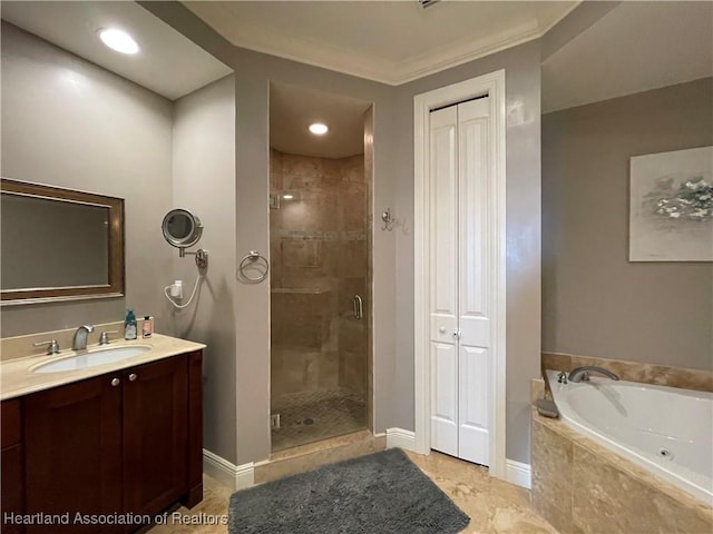 bathroom featuring tile patterned flooring, vanity, ornamental molding, and shower with separate bathtub