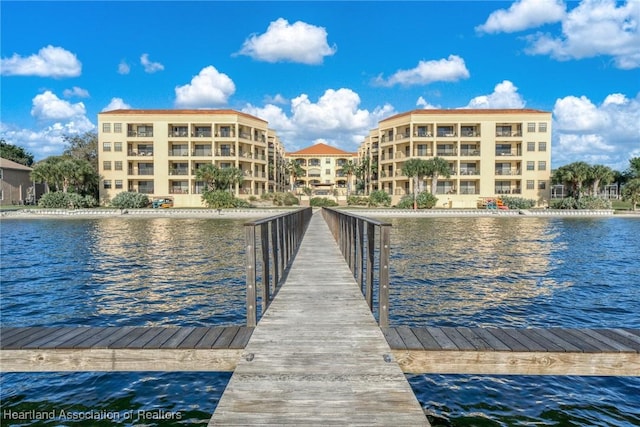 view of dock with a water view