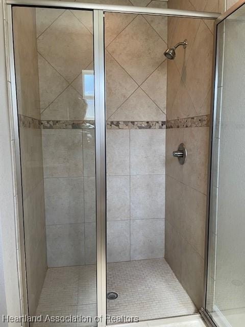 bathroom featuring walk in shower