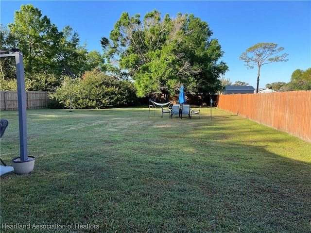 view of yard featuring fence