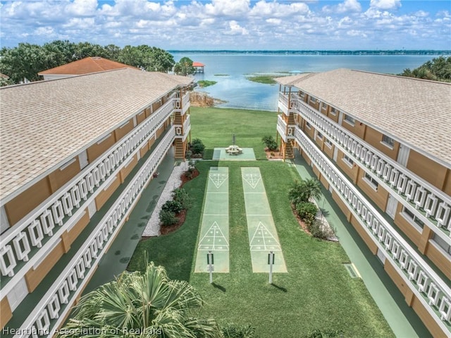 drone / aerial view with a water view