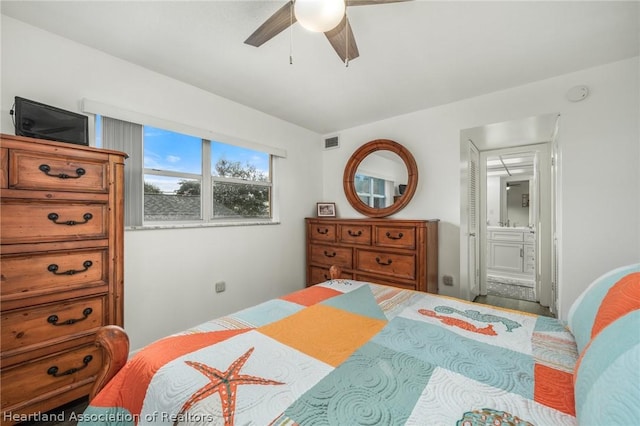 bedroom featuring ensuite bathroom and ceiling fan