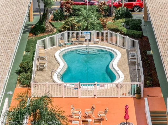 view of pool with a patio