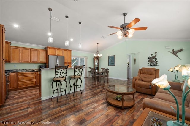 living room featuring ceiling fan with notable chandelier, lofted ceiling, crown molding, and dark wood-type flooring