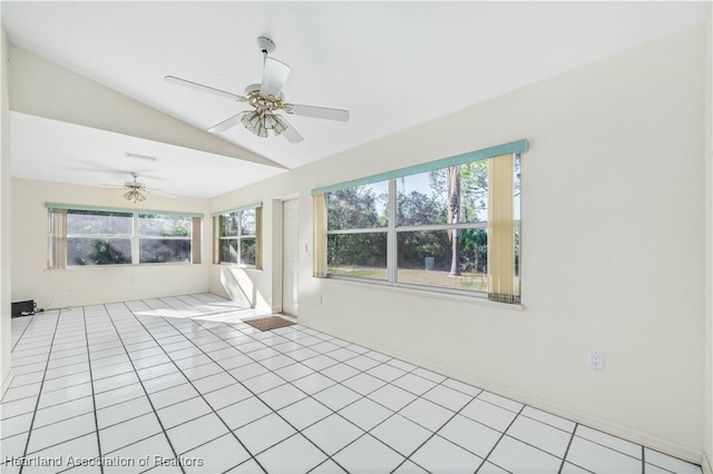 unfurnished sunroom with ceiling fan and vaulted ceiling