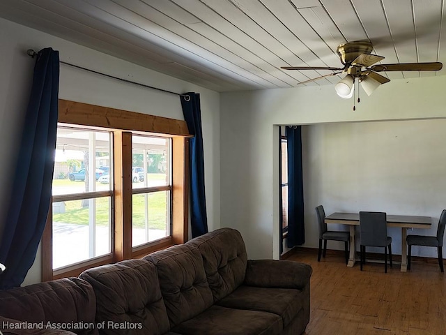 living room with wooden ceiling, ceiling fan, and wood finished floors