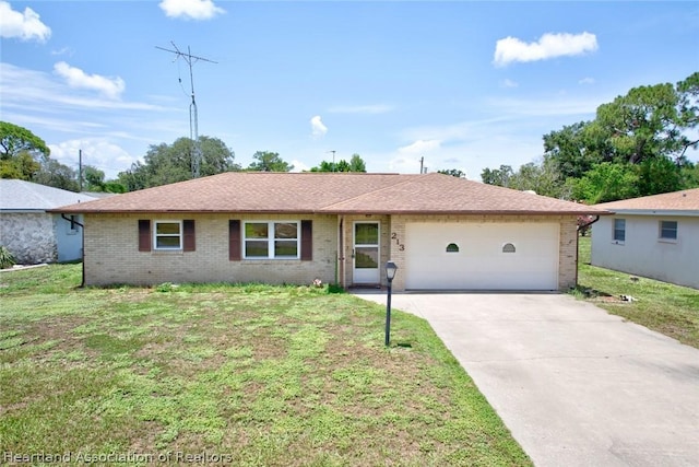 single story home with a front lawn and a garage