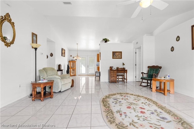 2433 N Highlands Blvd, Avon Park, FL 33825 - living room with a ceiling fan, light tile patterned floors, and lofted ceiling