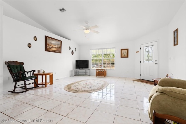 2433 N Highlands Blvd, Avon Park, FL 33825 - living area with vaulted ceiling, ceiling fan, and light tile patterned floors