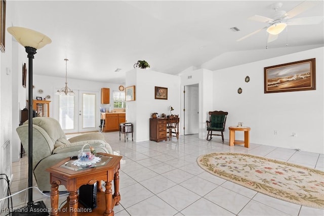 2433 N Highlands Blvd, Avon Park, FL 33825 - living room with lofted ceiling, ceiling fan, light tile patterned flooring, and french doors