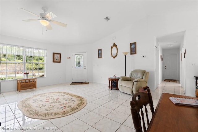 2433 N Highlands Blvd, Avon Park, FL 33825 - living room with light tile patterned floors, ceiling fan, and lofted ceiling