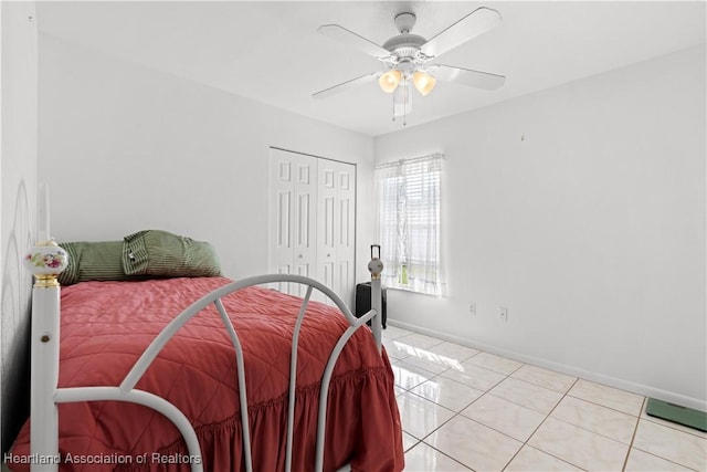 2433 N Highlands Blvd, Avon Park, FL 33825 - bedroom with light tile patterned flooring, a closet, baseboards, and ceiling fan