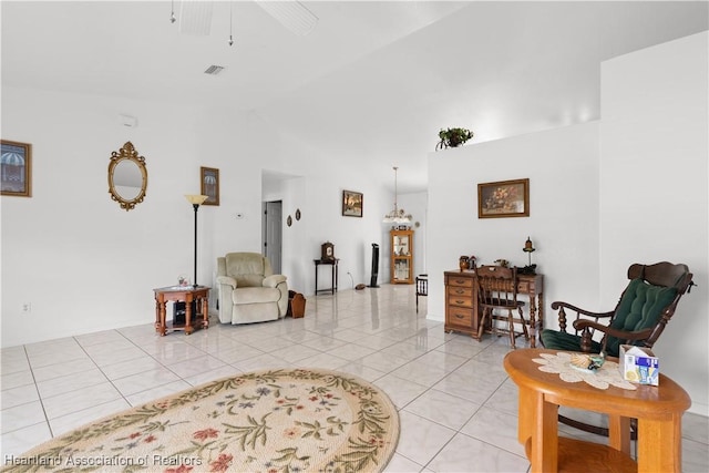 2433 N Highlands Blvd, Avon Park, FL 33825 - living area featuring lofted ceiling, ceiling fan, and light tile patterned flooring