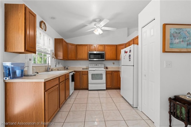 2433 N Highlands Blvd, Avon Park, FL 33825 - kitchen with white appliances, a sink, brown cabinets, ceiling fan, and lofted ceiling