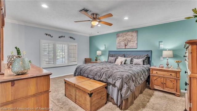 bedroom featuring ceiling fan, crown molding, and light carpet