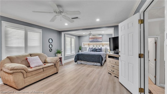 bedroom with ceiling fan, light wood-type flooring, and ornamental molding