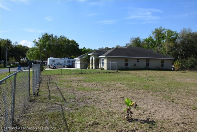 view of yard featuring fence