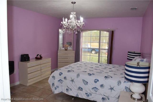bedroom with tile patterned flooring, visible vents, and a notable chandelier
