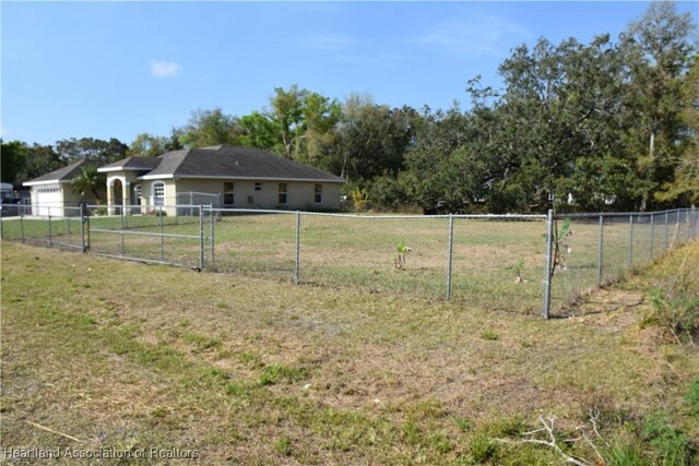 view of yard featuring fence