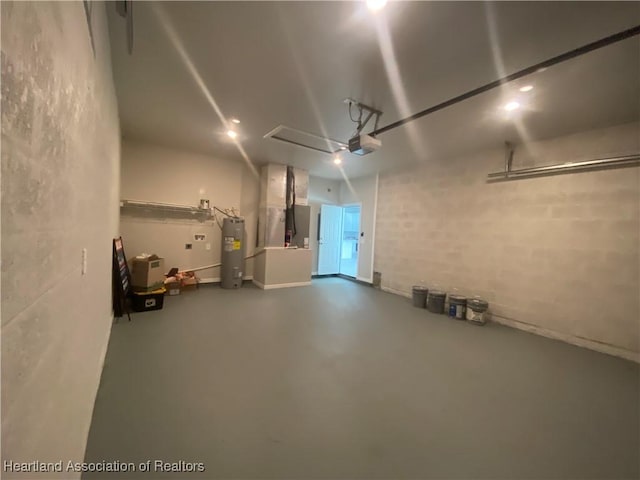 garage featuring heating unit, a garage door opener, and water heater